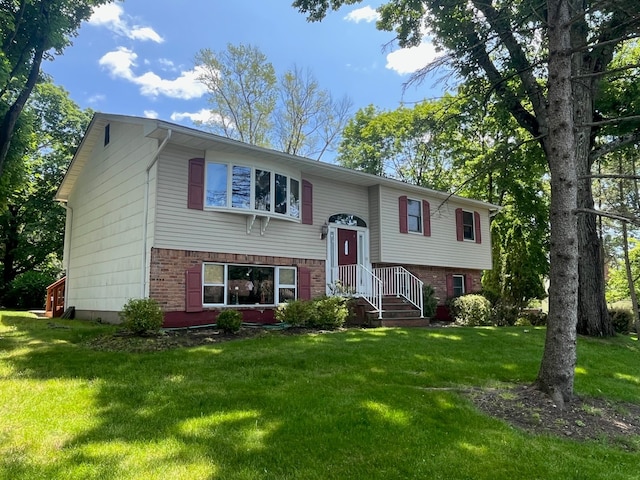 45 Princeton Dr, Tappan, NY 10983 - split foyer home featuring brick siding and a front yard