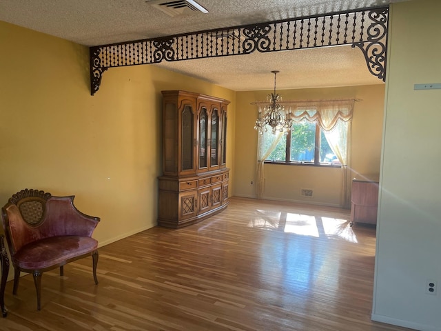 45 Princeton Dr, Tappan, NY 10983 - dining space with a textured ceiling, a chandelier, and wood finished floors