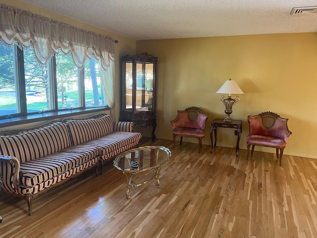 45 Princeton Dr, Tappan, NY 10983 - living room featuring wood finished floors and a textured ceiling