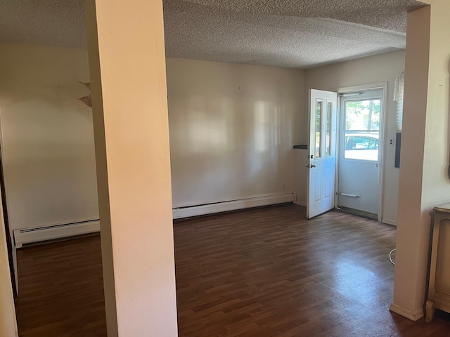 45 Princeton Dr, Tappan, NY 10983 - entryway featuring baseboard heating, wood finished floors, and a textured ceiling
