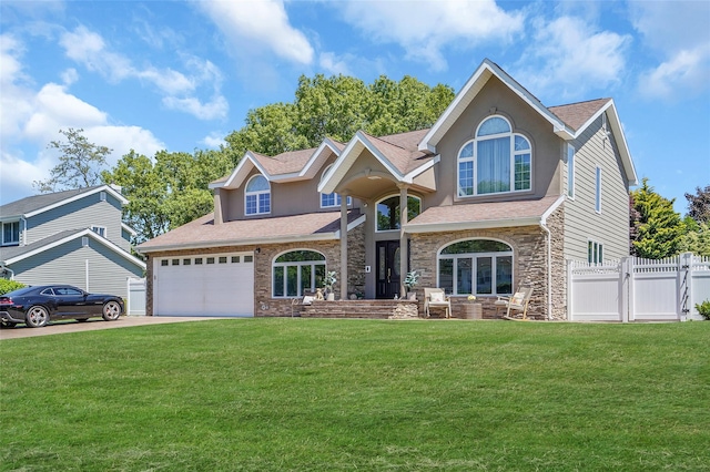 12 Barbera Rd, Commack, NY 11725 - traditional home with stone siding, concrete driveway, a shingled roof, and an attached garage