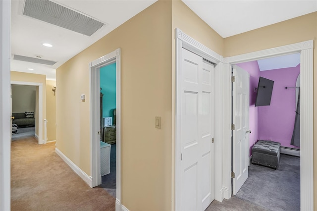 12 Barbera Rd, Commack, NY 11725 - hall with carpet, a baseboard radiator, and baseboards