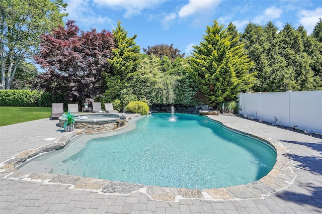 12 Barbera Rd, Commack, NY 11725 - view of swimming pool with a pool with connected hot tub and a patio area