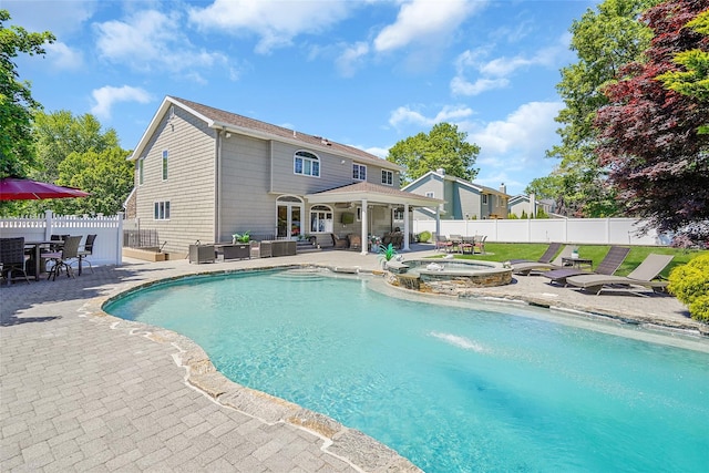 12 Barbera Rd, Commack, NY 11725 - view of swimming pool featuring a patio, outdoor dining area, an outdoor hangout area, and a pool with connected hot tub