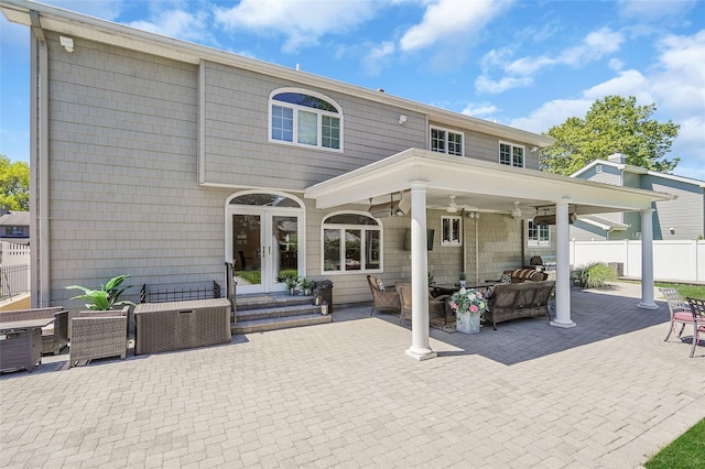12 Barbera Rd, Commack, NY 11725 - back of property with a patio, french doors, an outdoor hangout area, ceiling fan, and central AC