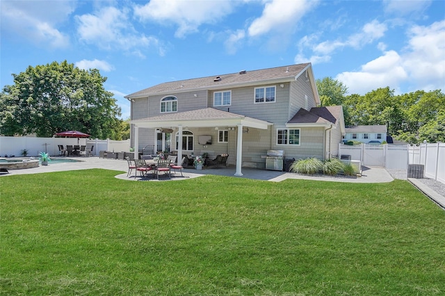 12 Barbera Rd, Commack, NY 11725 - rear view of house featuring a patio area and roof with shingles