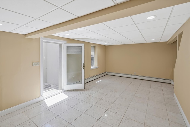 12 Barbera Rd, Commack, NY 11725 - empty room with a paneled ceiling, baseboards, light tile patterned floors, recessed lighting, and a baseboard heating unit
