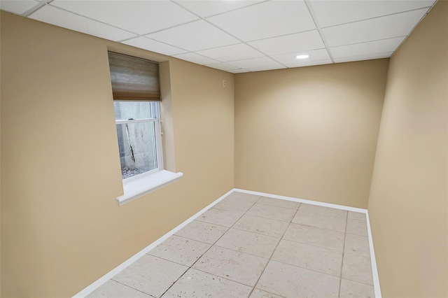 12 Barbera Rd, Commack, NY 11725 - unfurnished room with baseboards, a drop ceiling, light tile patterned flooring, and recessed lighting