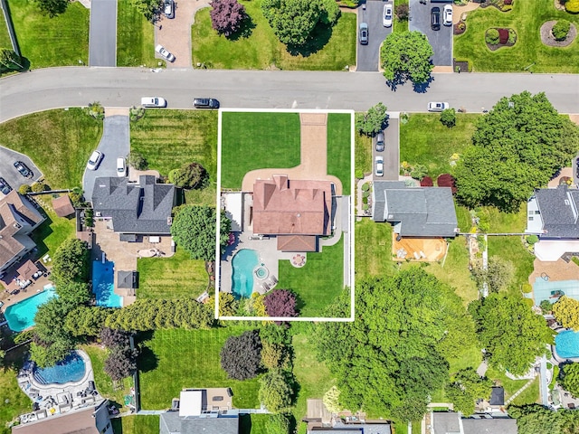 12 Barbera Rd, Commack, NY 11725 - aerial view of residential area with a pool area and property boundaries highlighted