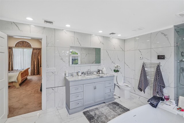 12 Barbera Rd, Commack, NY 11725 - bathroom with tile walls, marble finish floors, vanity, connected bathroom, and recessed lighting