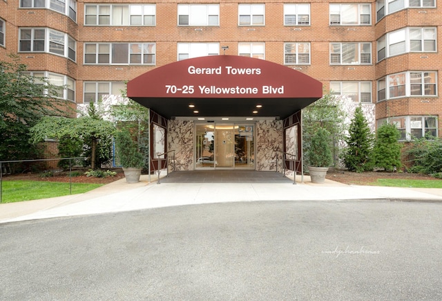 entrance to property with brick siding