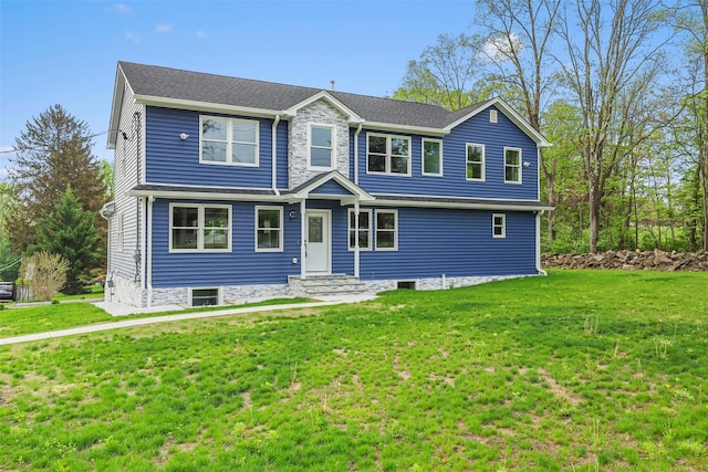 view of front facade with a front yard