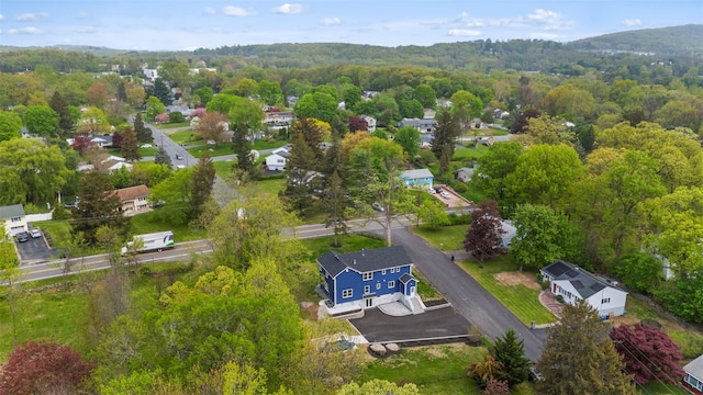 aerial view featuring a view of trees