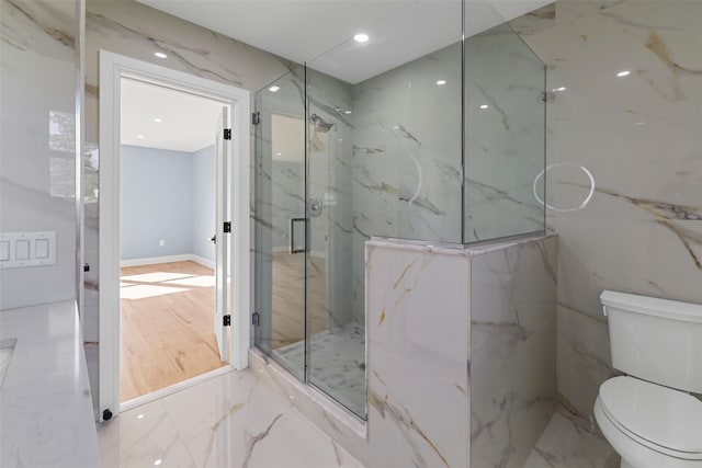full bath featuring toilet, a marble finish shower, marble finish floor, and recessed lighting