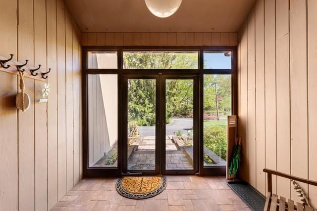 6 Circle Dr, Shoreham, NY 11786 - doorway to outside featuring wooden walls