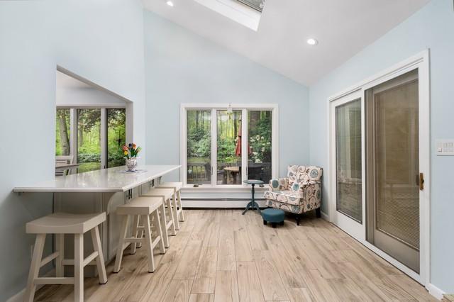 6 Circle Dr, Shoreham, NY 11786 - deck featuring a baseboard heating unit