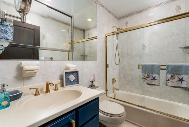 6 Circle Dr, Shoreham, NY 11786 - bathroom with tile walls, vanity, and enclosed tub / shower combo