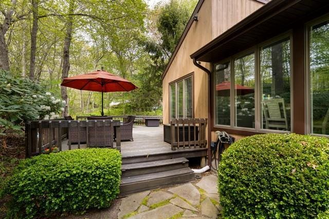 6 Circle Dr, Shoreham, NY 11786 - wooden terrace with outdoor dining area