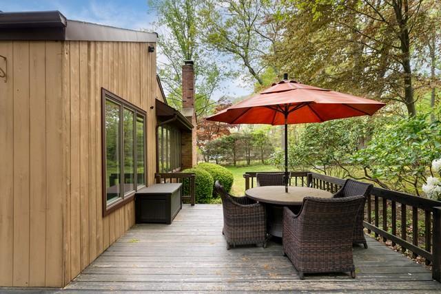 6 Circle Dr, Shoreham, NY 11786 - wooden terrace with outdoor dining space