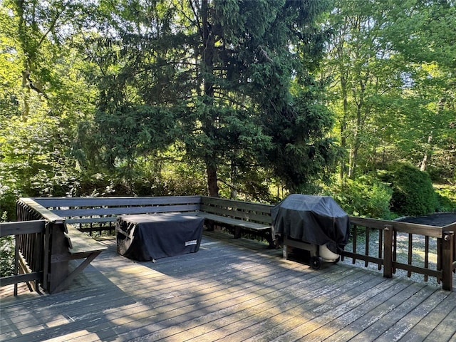 6 Circle Dr, Shoreham, NY 11786 - wooden terrace with a grill and a wooded view