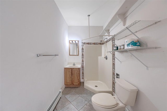 full bathroom with vanity, baseboards, a stall shower, and toilet