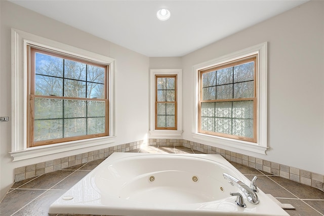 full bath with a wealth of natural light and a jetted tub