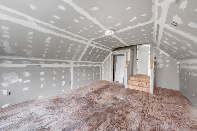 bonus room featuring lofted ceiling