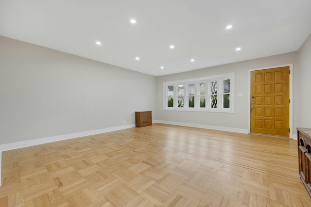 39 Crestmont Ave, Yonkers, NY 10704 - unfurnished living room featuring baseboards and recessed lighting