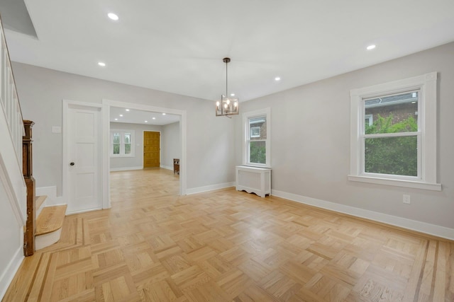 39 Crestmont Ave, Yonkers, NY 10704 - unfurnished room featuring baseboards, radiator heating unit, a chandelier, and recessed lighting