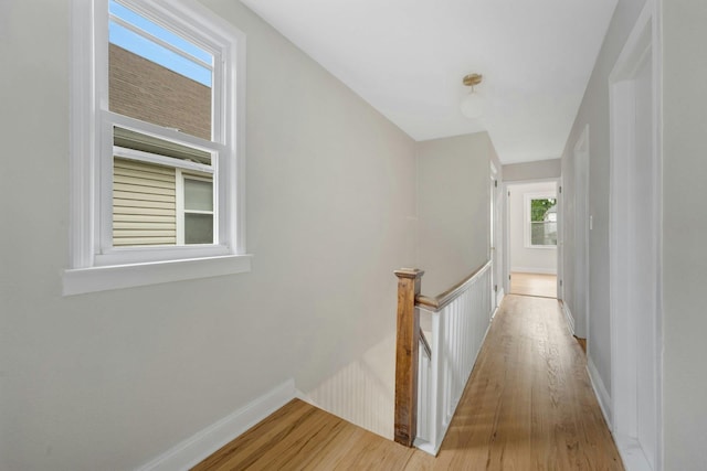 39 Crestmont Ave, Yonkers, NY 10704 - corridor with light wood-style floors, an upstairs landing, and baseboards