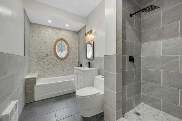 39 Crestmont Ave, Yonkers, NY 10704 - full bathroom with tile walls, a tile shower, tile patterned flooring, vanity, and toilet