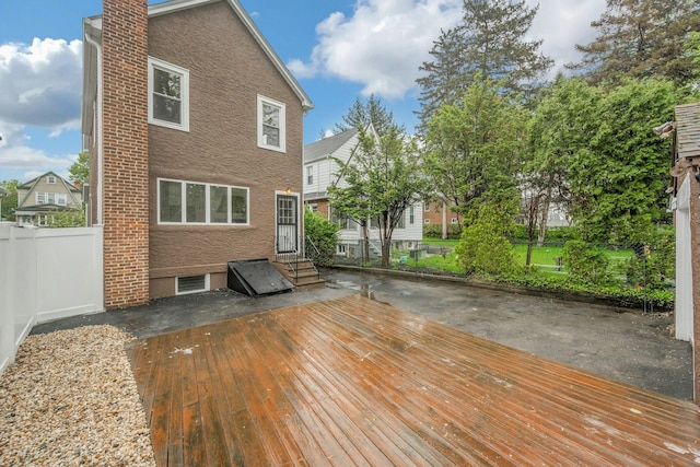 39 Crestmont Ave, Yonkers, NY 10704 - wooden deck with entry steps, fence, and a patio area