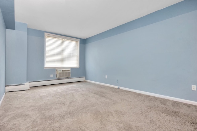 40 Daley Pl Unit 230, Lynbrook, NY 11563 - carpeted spare room featuring baseboards, a wall mounted air conditioner, and a baseboard heating unit