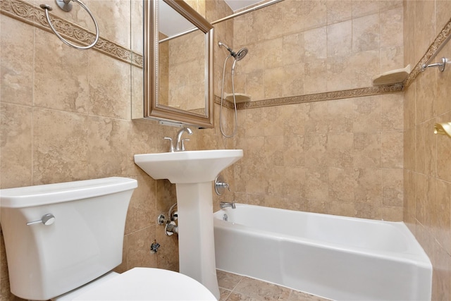 40 Daley Pl Unit 230, Lynbrook, NY 11563 - bathroom with toilet, tile walls, and shower / bathtub combination