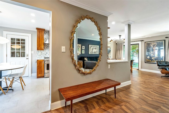 corridor with crown molding, baseboards, and recessed lighting