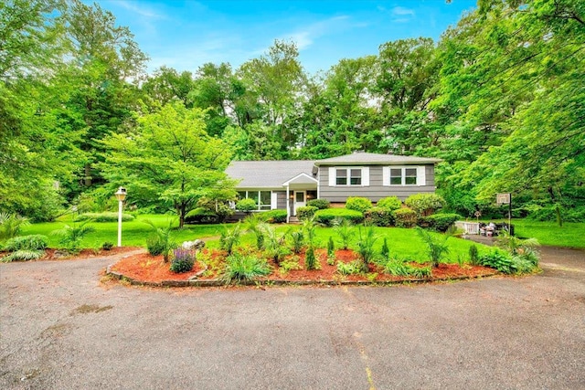 83 Sherwood Rd, Cortlandt Manor, NY 10567 - tri-level home with a front yard