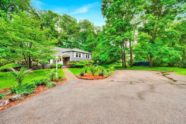 83 Sherwood Rd, Cortlandt Manor, NY 10567 - split level home with a front yard