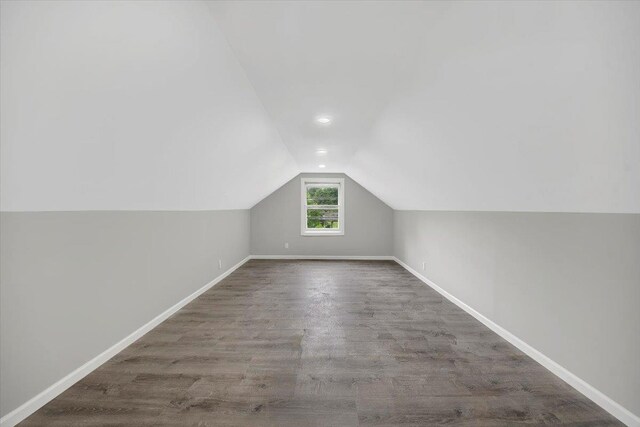 83 Sherwood Rd, Cortlandt Manor, NY 10567 - additional living space featuring vaulted ceiling, baseboards, and wood finished floors