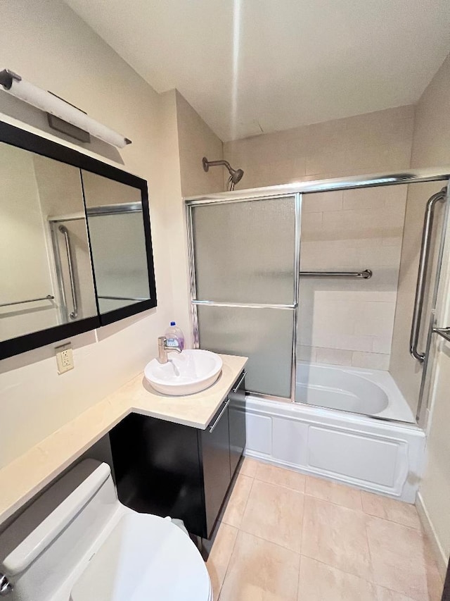 31-32 Union, Flushing, NY 11354 - bathroom with toilet, combined bath / shower with glass door, tile patterned flooring, and vanity