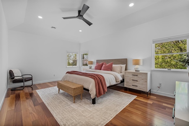 bedroom with visible vents, baseboards, hardwood / wood-style floors, and recessed lighting