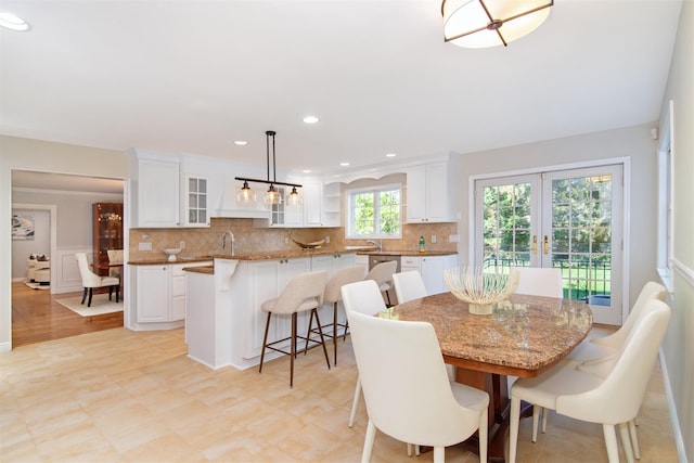 668 Francis St, Pelham, NY 10803 - dining area with french doors and recessed lighting