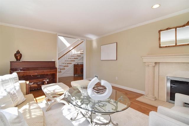 668 Francis St, Pelham, NY 10803 - living room with wood finished floors, stairs, baseboards, ornamental molding, and recessed lighting