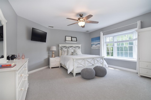 668 Francis St, Pelham, NY 10803 - bedroom featuring light colored carpet, visible vents, baseboards, and a ceiling fan