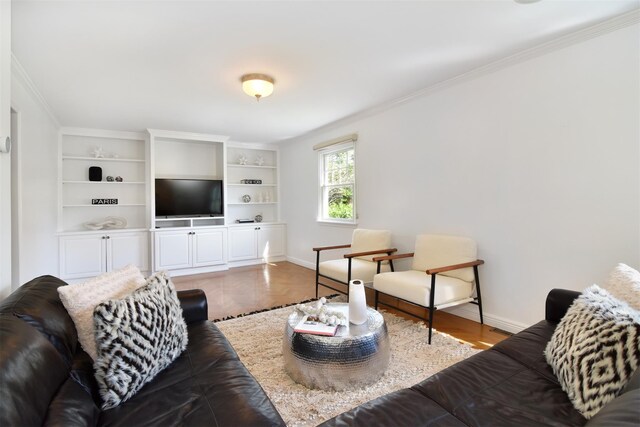 668 Francis St, Pelham, NY 10803 - living area with crown molding, baseboards, and wood finished floors