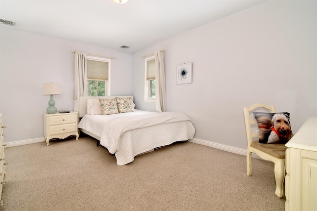 668 Francis St, Pelham, NY 10803 - bedroom with light colored carpet and baseboards