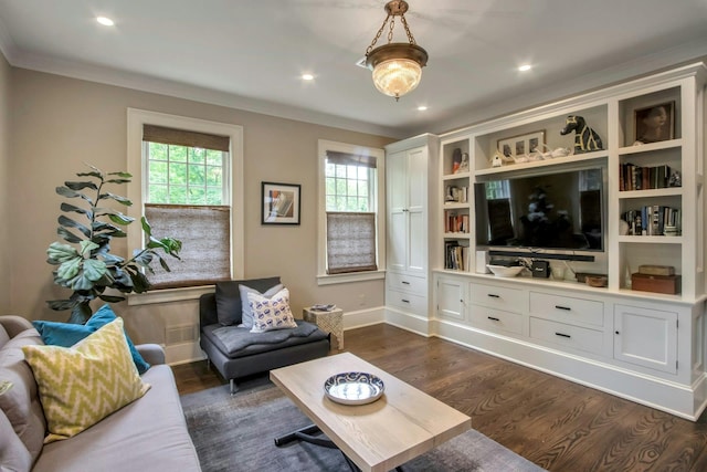 living room featuring dark wood finished floors, ornamental molding, recessed lighting, and baseboards