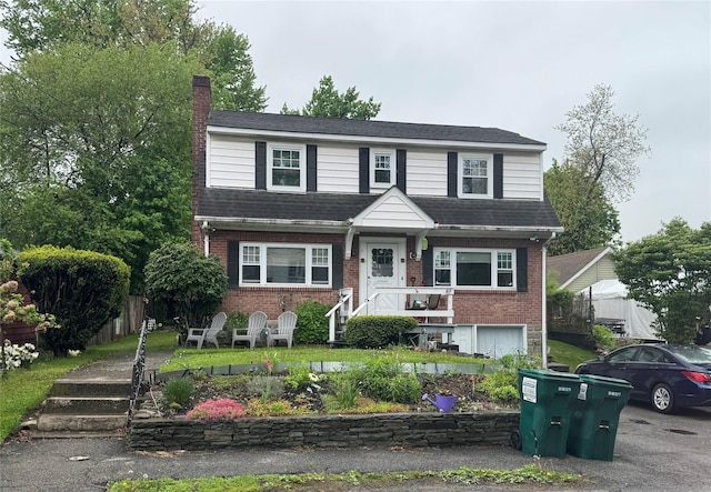 5 W Stone St, Newburgh, NY 12550 - view of front of home featuring a chimney and brick siding