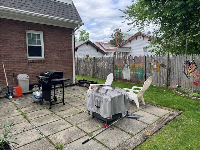 5 W Stone St, Newburgh, NY 12550 - view of patio with a grill and a fenced backyard