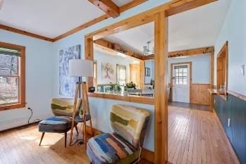 7181 County Highway 7, Roscoe, NY 12776 - sitting room featuring wood finished floors, wainscoting, and beamed ceiling