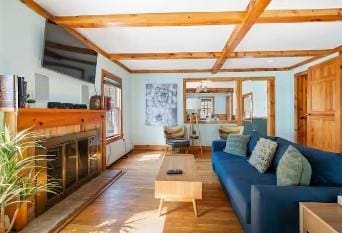7181 County Highway 7, Roscoe, NY 12776 - living area with beamed ceiling, wood finished floors, and baseboards